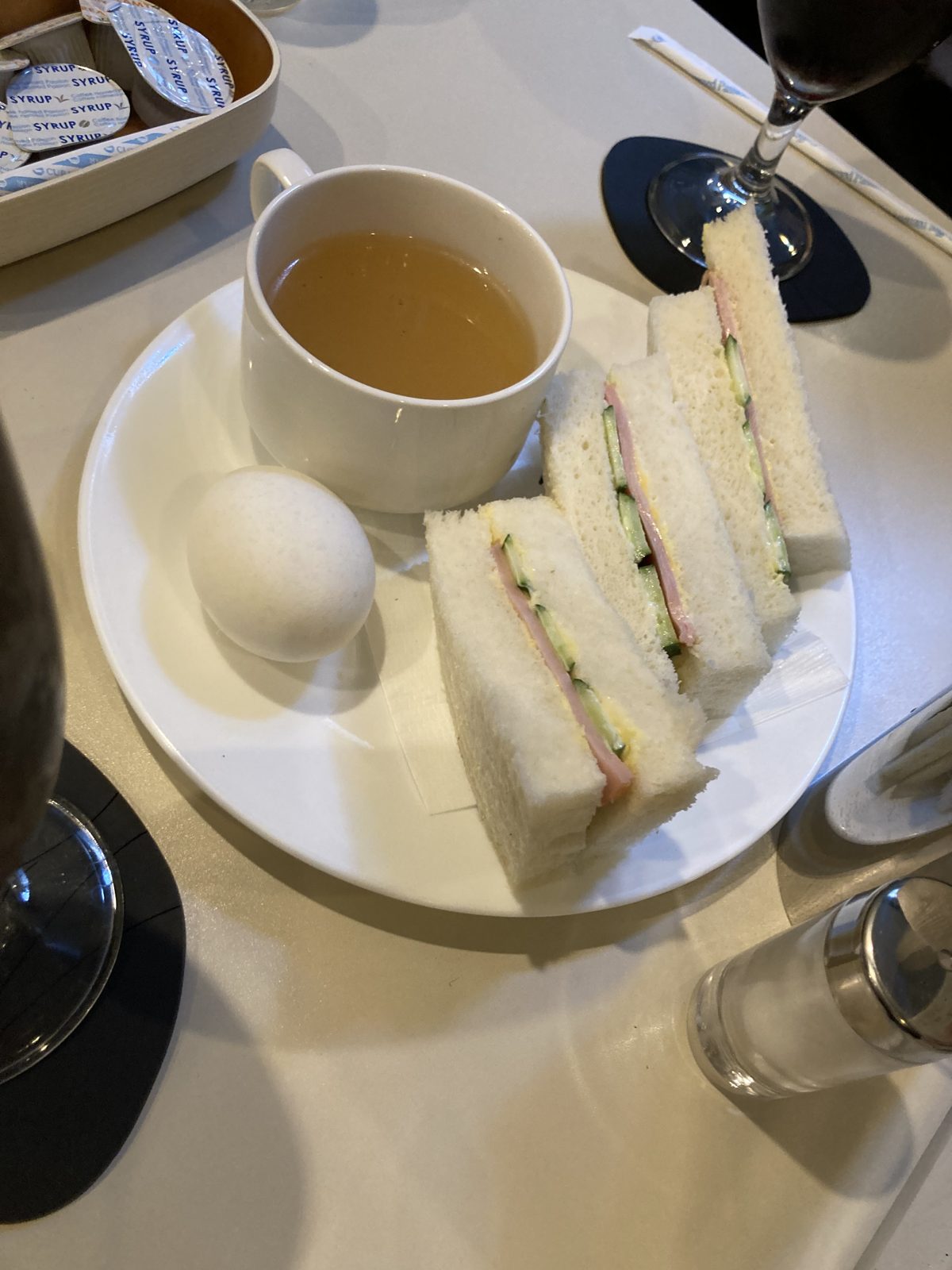 A sandwich set with coffee at a Renoir coffee shop